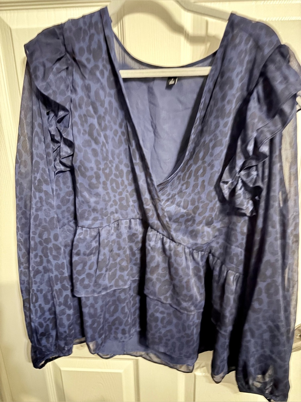 374- torrid long sleeve blue leopard ruffle blouse